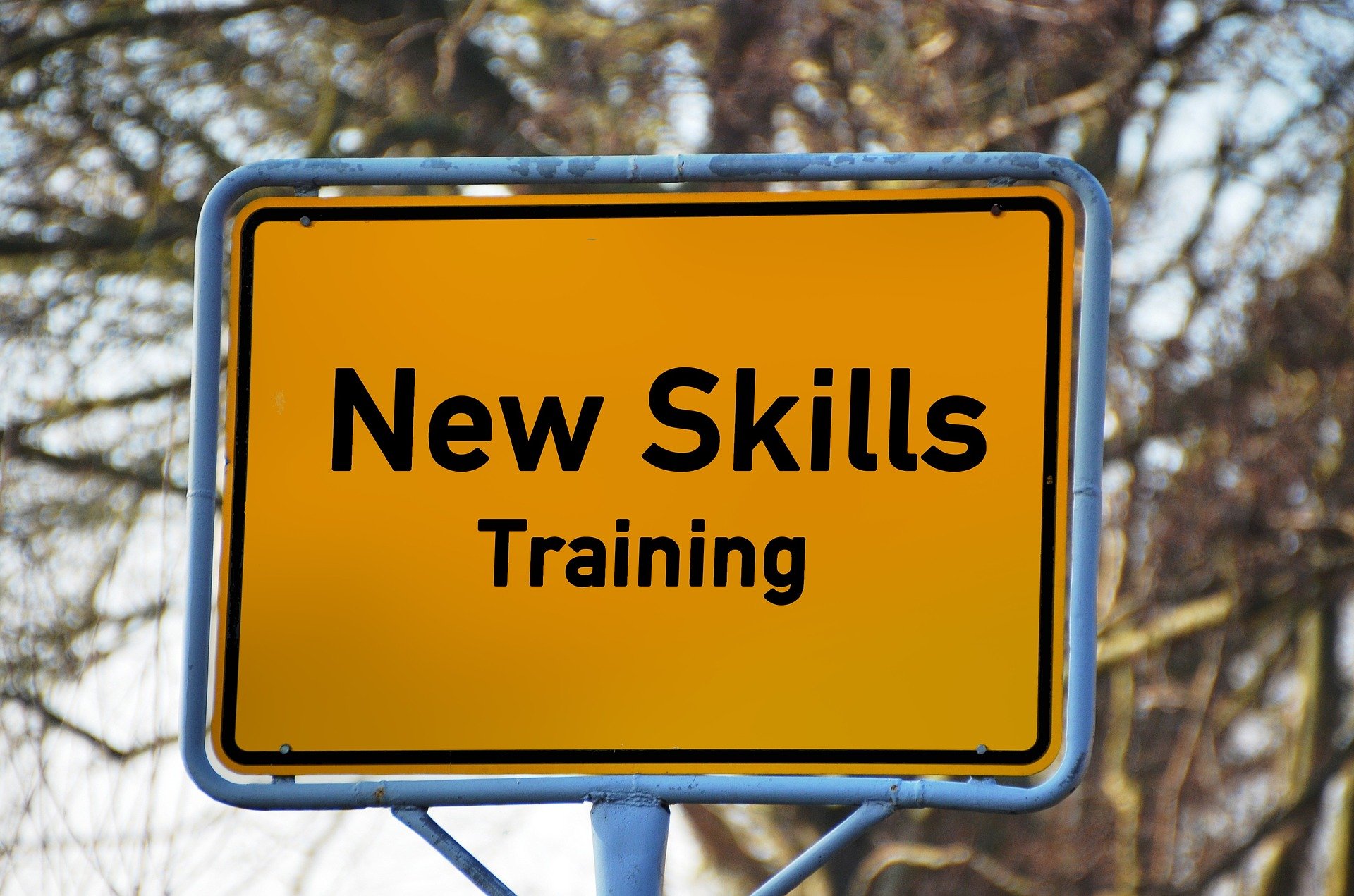 New skills training painted on street sign